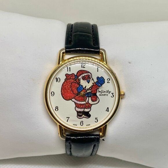 Vintage infinity Santa dial wrist watch gold tone 35mm round quartz running - Picture 1 of 8
